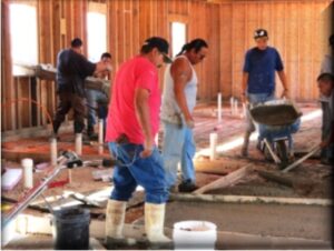 Workers doing building construction on a Mission Team Project